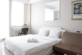 Bright Studio Room at Dago Suites Apartment near ITB By Travelio